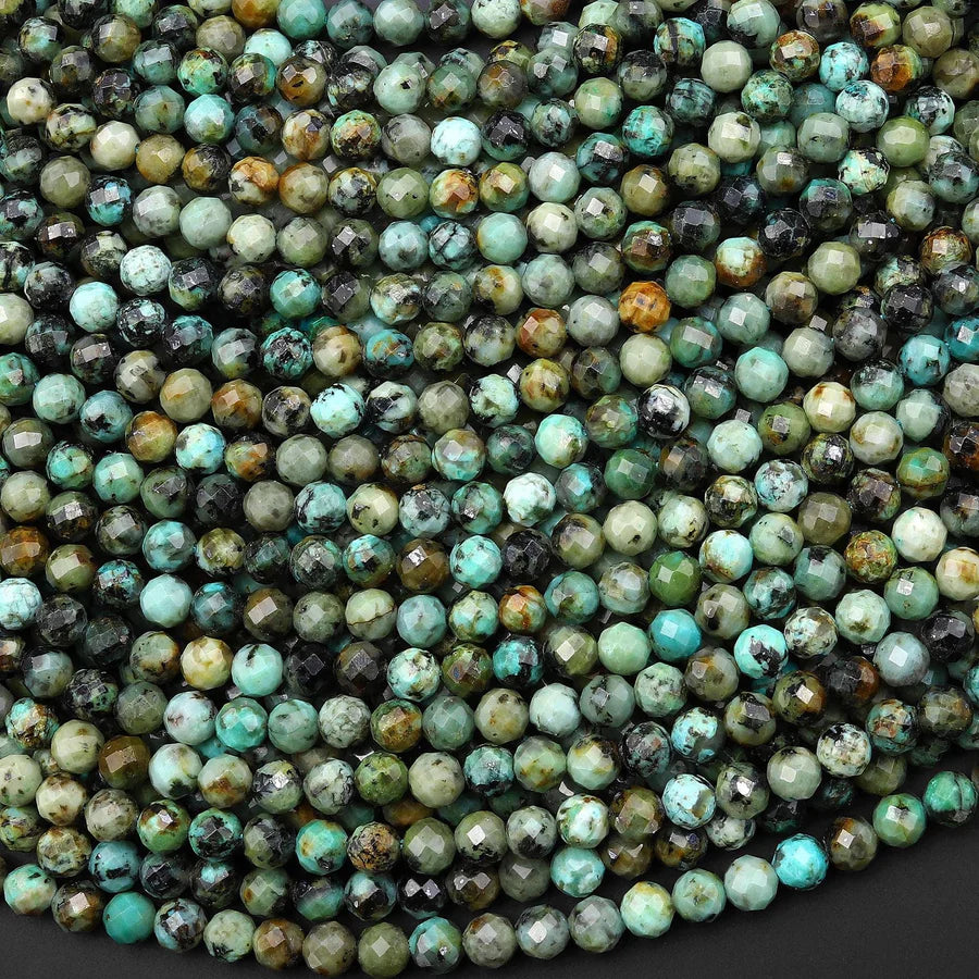 Close-up of faceted turquoise beads on a dark background