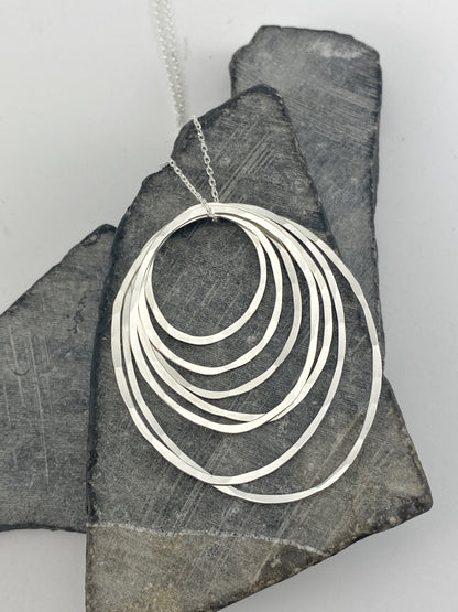 Silver Seven Ring Necklace | Karma Necklace | Circle Pendant | Hammered Circle Necklace | Family Necklace | Generations Necklace | Mother Necklace | 70th Birthday Present