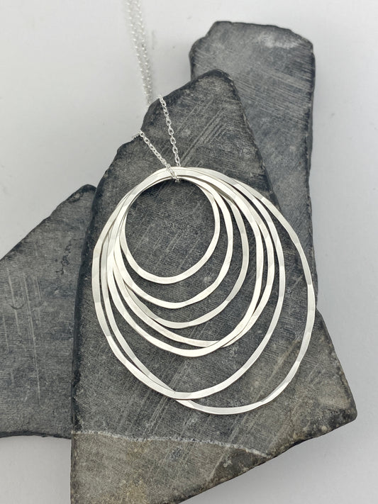 Silver Seven Ring Necklace | Karma Necklace | Circle Pendant | Hammered Circle Necklace | Family Necklace | Generations Necklace | Mother Necklace | 70th Birthday Present