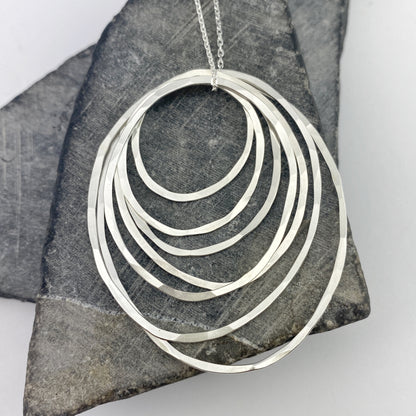 Silver Seven Ring Necklace | Karma Necklace | Circle Pendant | Hammered Circle Necklace | Family Necklace | Generations Necklace | Mother Necklace | 70th Birthday Present