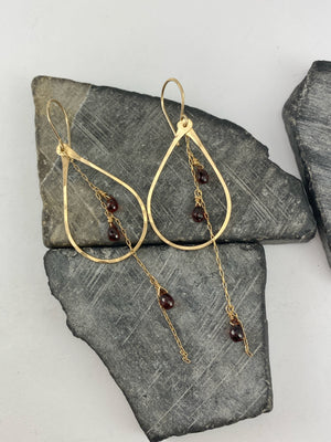 Gold Garnet Teardrop Hoops | Gold Teardrop Earrings | Teardrop Hoops | Geometric Earrings | Garnet Earrings | Minimalist Earrings | Boho Teardrop Earrings | 14 K Gold Fill | Birthstone Jewelry | January Birthday | Birthstone Earrings