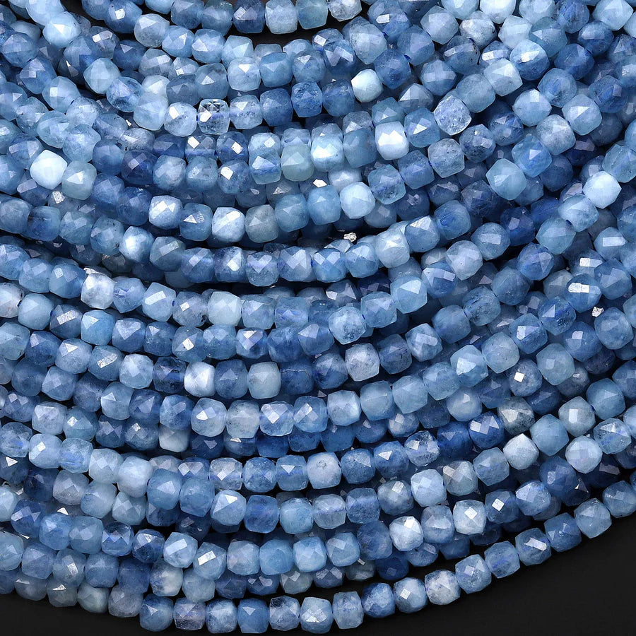 close up of genuine, faceted aquamarine beads used for birthstone charm jewelry